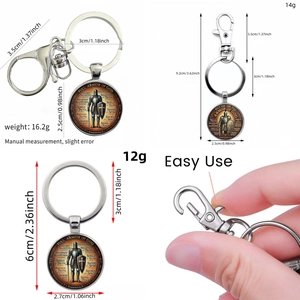 Detail showing various sizes of St. Benedict Armor of God medal keychains with lobster clasps