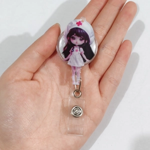 Retractable acrylic badge reel featuring a cute cartoon nurse design with PVC strap