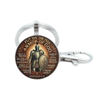 Detailed view of Saint Benedict armor of God medal keychain with lobster clasp and ring