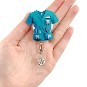 Nurse uniform badge reel with retractable clip and blue dental scrubs design for medical staff