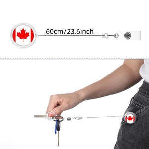 Retractable badge reel with Canadian maple leaf design showing 60cm cord extension
