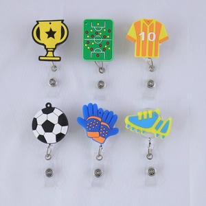 Retractable sports badge reels featuring 3D soccer jersey ball and trophy designs