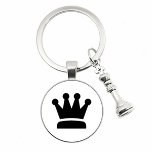 Silver chess keychain with a black crown glass pendant and king piece charm