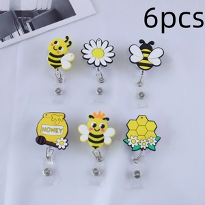 Set da 6 porta badge retrattili in PVC a tema api con margherite e vasetto di miele