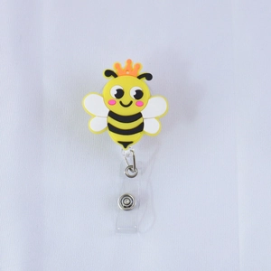 Portabadge retrattile in PVC con ape cartone animato e strisce gialle vivaci