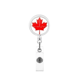 Close-up of retractable badge holder with Canadian maple leaf and skyline detail