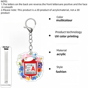 Detail view of acrylic blood bag keychain with UV print and metal lobster clasp