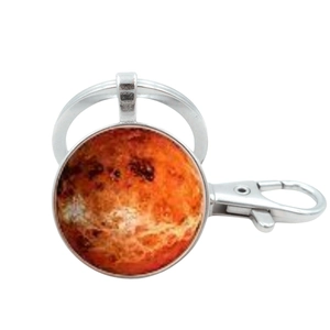 Detailed macro view of silver planet keychain featuring Mars sphere pendant with orange texture