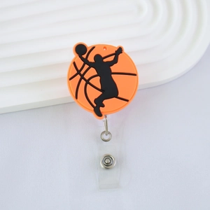 Detailed view of retractable basketball badge reel with silicone cover and athlete silhouette