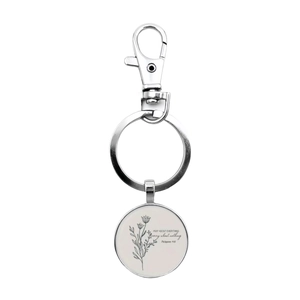 Silver keyring with Bible verse Pray About Everything and botanical illustration detail