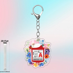 Detail view of 0.25cm thick acrylic blood bag keychain with flowers for nurses