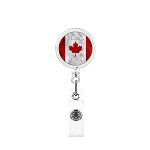 Detail of retractable badge reel featuring Canada flag design with a white plastic strap