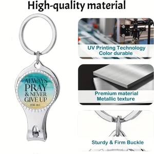 Detail of multi-functional nail clipper keychain with UV printed inspirational glass cabochon