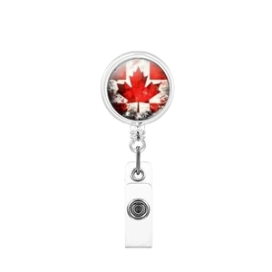Detail of retractable badge holder with Canada flag emblem and silver metal clip