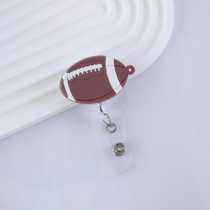 Detailed view of rugby-shaped retractable badge holder with realistic silicone texture
