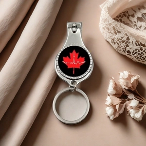 Multifunctional Canada maple leaf nail clipper keychain with Toronto skyline silhouette