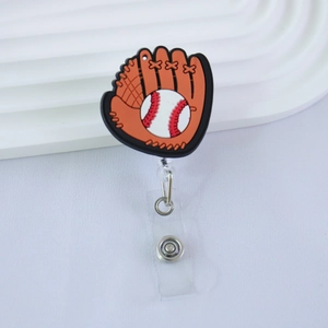 Detailed view of retractable baseball themed badge reel with glove and ball design