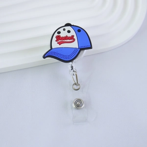 Detail of retractable badge holder with blue baseball cap design and secure snap strap