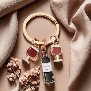 Gold wine themed keychain with Lafite 1982 bottle and red wine glass enamel charms