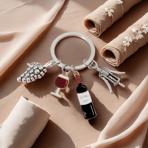 Red wine themed keychain with grape, goblet, wine bottle and corkscrew charms