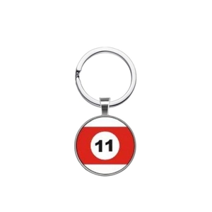 Detail of silver billiard number 11 keychain with red and white striped gemstone pattern