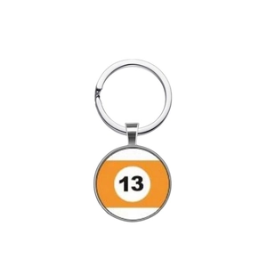 Detailed macro view of silver keychain featuring the number 13 billiard ball design