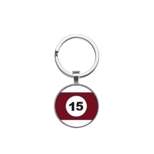 Detailed view of billiard number 15 key ring with dark red stripe and metallic finish