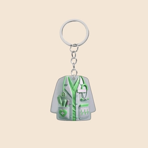 Detailed view of flat acrylic nurse uniform car pendant with medical graphics and metal ring