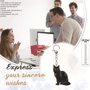 Detailed view showing the 0.25cm thickness of this 2D acrylic black cat keychain accessory
