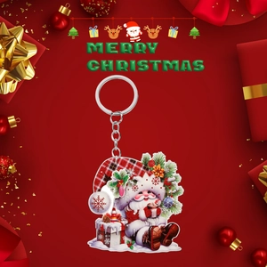Close-up of 2D acrylic Christmas keychain featuring a cute Santa Claus with a metal ring