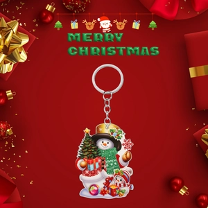 Detailed view of snowman acrylic keychain with festive Christmas tree and gift box design