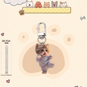 Detail view of 0.25cm thick 2D acrylic keychain featuring a cute cat in blue pajamas