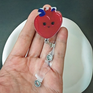Cartoon anatomical heart badge reel made of red acrylic with retractable string for nurses