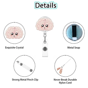 Detail view of pink brain badge reel with metal alligator clip and retractable nylon cord