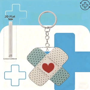 Detail view of 0.25cm flat acrylic bandage keychain with heart and polka dots