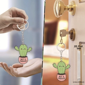 Detail view of 2D flat acrylic cactus keychain showing 0.25cm thickness and metal ring