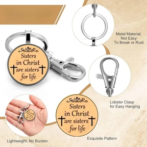 Detail of Sisters in Christ silver keychain with round pendant and sturdy lobster clasp