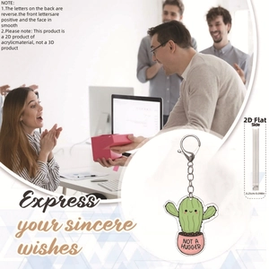 Detail view of 0.25cm thick 2D acrylic cactus keychain with Not a Hugger text