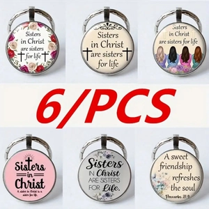 Set of six silver sisters in Christ glass cabochon keychains with floral and bible designs