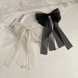 Eleganti fermagli per capelli a fiocco oversize con perle bianche in nero e beige crema