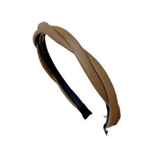 Elegant dark brown twisted faux leather headband with retro French cross design