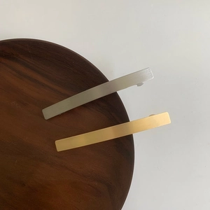 Minimalist gold and silver metal bar hair clips set with brushed texture finish