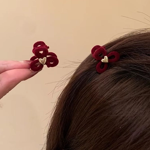 Set of two red velvet flower hair clips with gold heart detail in vintage French style