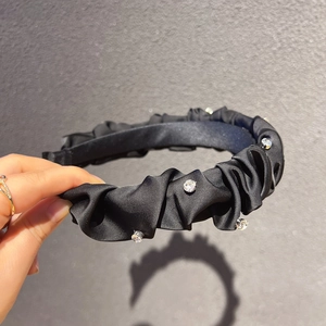 Elegant black pleated satin headband with sparkling rhinestones for women hair styling