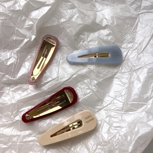 Lot de 4 barrettes en acétate en forme de goutte aux couleurs pastel rose et bleu