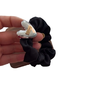 Elastic black scrunchie hair tie with metallic silver heart and Lovedays gold accent
