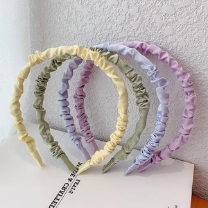 Pleated satin hairbands in macaron colors including yellow, green, purple, blue, and pink
