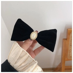 French vintage black velvet bow hair clip with white pearl detail for women