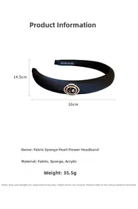 Detailed view of black fabric padded headband showing rose ornament and 16cm width size