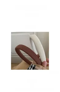 Detail showing waffle texture sponge headband width measurement approximately 2cm